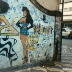 Cíntia Monteiro - 1990 - Rua da Consolação, em São Paulo. Grafite de Maurício Villaça em homenagem à Rainha do Frango Assado de Alex Vallauri.